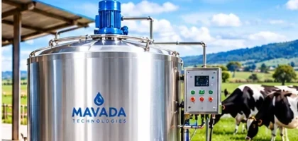 Stainless steel milk cooling tank with refrigeration unit at a dairy farm in Kenya.