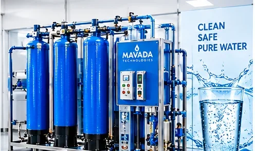 Industrial water purification system with blue filtration tanks, pipes and control equipment in Kenya.